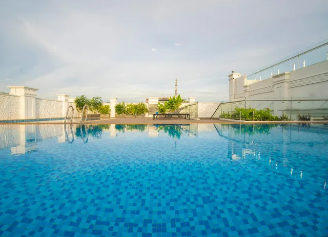 غرفة بسرير فردي وسريرين بغرفة نوم واحدة، T-Ritz Saigon Hotel & Apartment 2/2