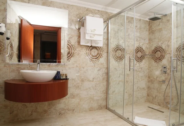 غرفة عائلية بسرير فردي مع أريكة، Grand Vuslat Hotel 1/2
