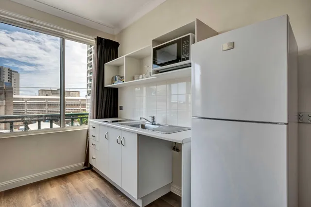1 Bedroom, Apartment, Queen Bed, Two Story, Dining Area, Kitchen, Bathtub، City Oasis Inn Townsville SureStay Collection by BW 5/5