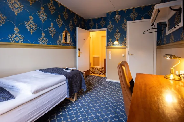 غرفة قياسية مفردة بسرير فردي، Milling Hotel Plaza 1/7