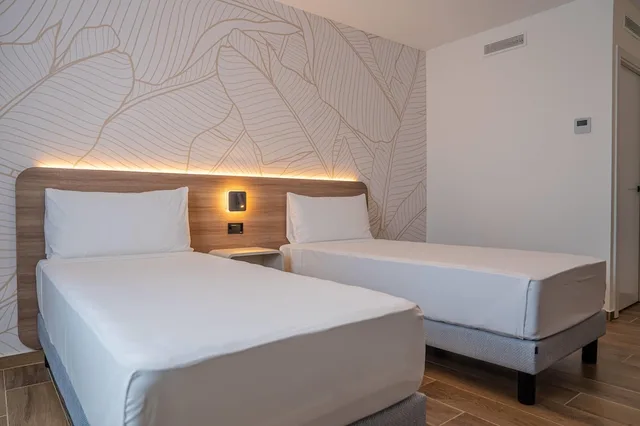 غرفة بسريرين مزدوجين بإطلالة على الحديقة، Days Inn by Wyndham Juan Dolio 2/9