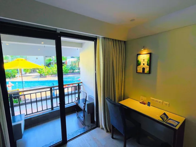 Room, Double Bed, Pool View, Balcony, Sobit Sarovar Portico Goa 3/10