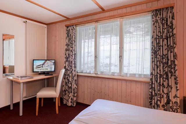 غرفة بسرير مزدوج أو سريرين منفصلين، Jungfrau Lodge - Swiss Mountain Hotel 5/6