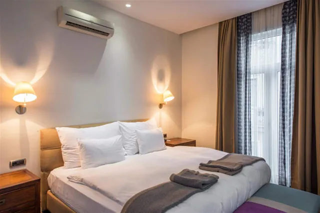 غرفة ديلوكس بسرير كينج مع أريكة، Misafir Suites 8 Istanbul. 10/10