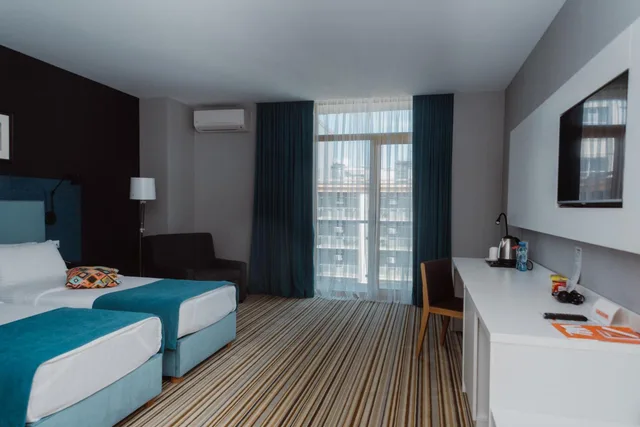 Deluxe Triple Room:، Tangerine Apart Hotel Batumi 10/10