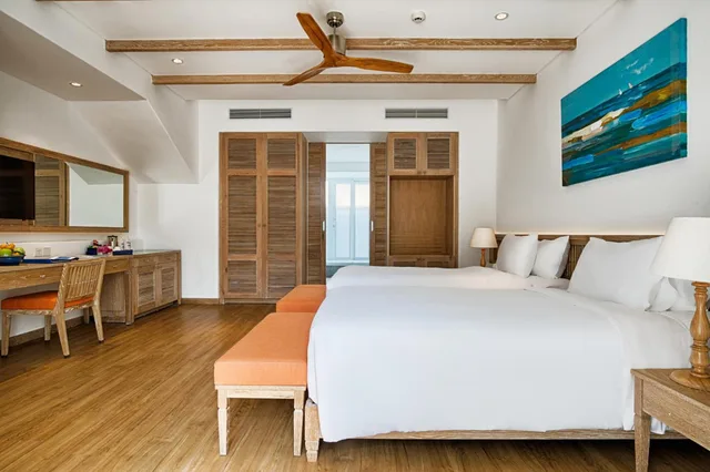 جناح جونيور بسريرين منفصلين بشرفة بحوض استحمام، Risemount Premier Resort Danang 1/6