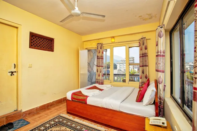 غرفة ديلوكس بسرير كوين، Hotel Grand Holiday 1/5
