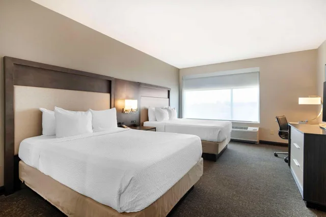 جناح بسريرين كوين مع أريكة، Best Western Plus Executive Residency Rigby's Water World Hotel 1/2
