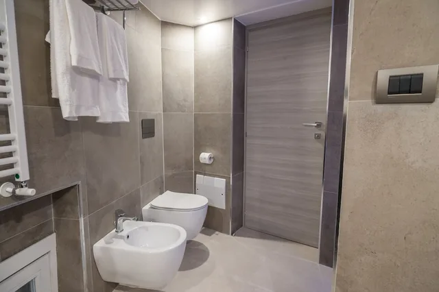 غرفة بسرير مزدوج أو سريرين منفصلين، Wellness Home Rome 3/5