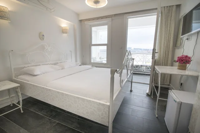 غرفة ديلوكس بسرير مزدوج بإطلالة على البحر، Buyukada Port Hotel 5/10