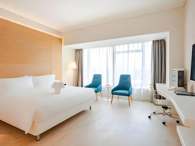 غرفة قياسية بسرير كينج، Garden Lane Meilan Airport Hotel Formerly Haikou Meilan Airport Hotel 1/2