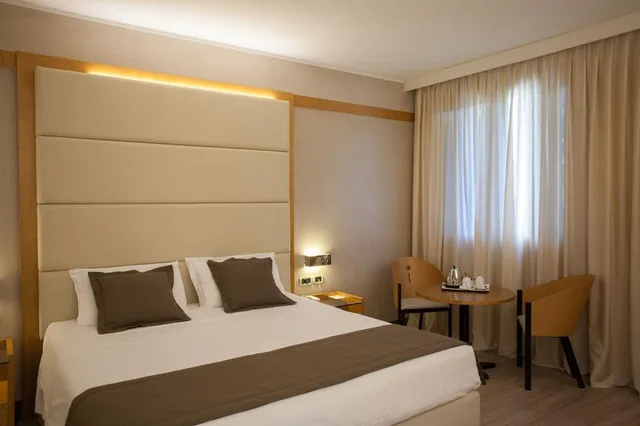 غرفة ديلوكس بسرير مزدوج أو سريرين منفصلين، Park Hotel Ai Pini 1/3