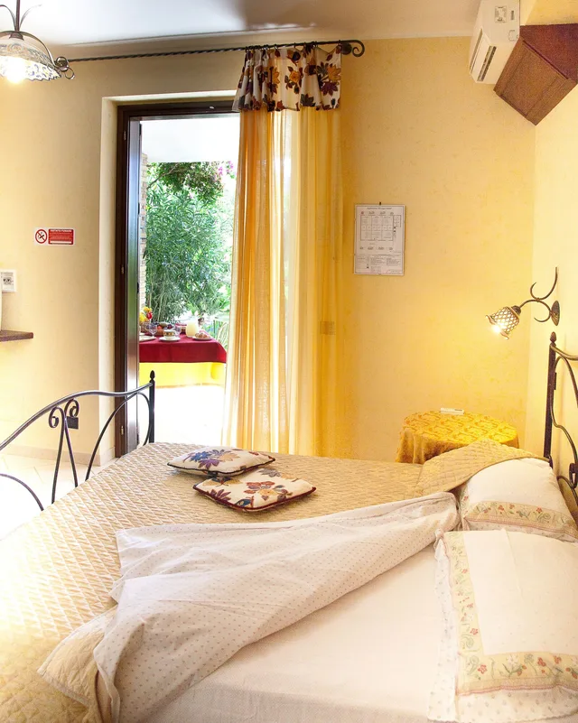 غرفة ثلاثية بسرير كوين وسرير فردي، Agriturismo Al Lago Verde 2/2