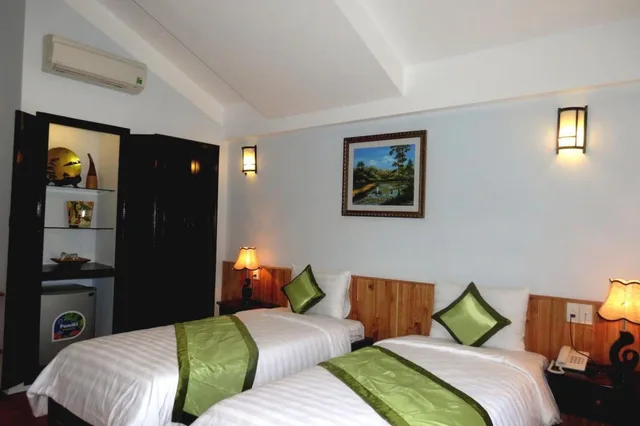 غرفة ديلوكس بسرير كينج بشرفة، Starfruit Homestay Hoi An 3/10