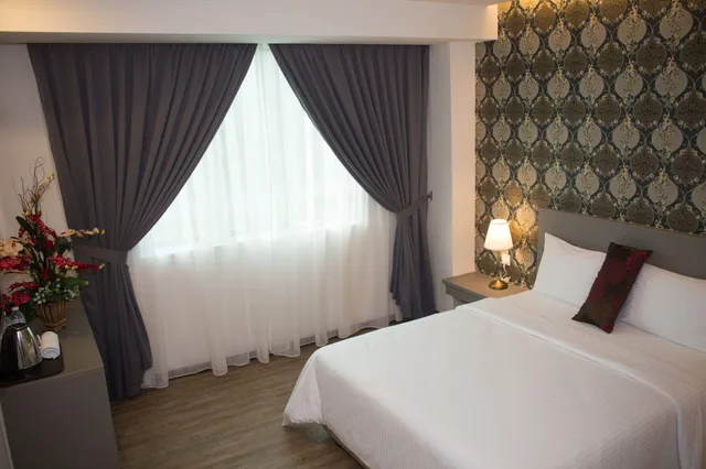 غرفة ديلوكس بسرير كوين، Qlassic Hotel 1/2