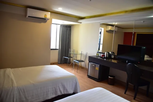 غرفة قياسية بسريرين منفصلين، Grand Pink Hotel Hat Yai 1/5