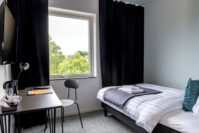 غرفة مفردة بسرير فردي، First Hotel Kokoloko 1/2