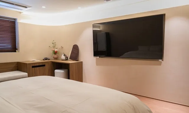 غرفة ديلوكس بسرير كينج، Jamsil Orosie Tourist Hotel 2/5