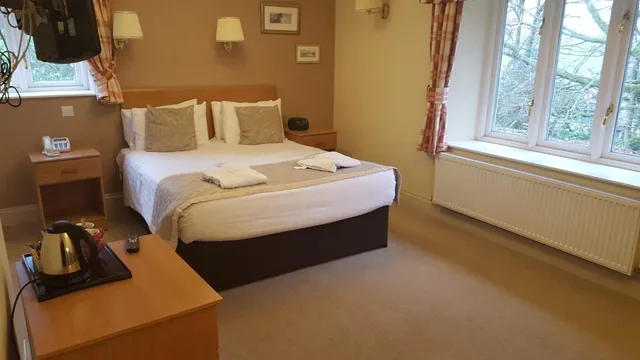 غرفة بسرير كينج في الملحق، Windermere Manor 1/2