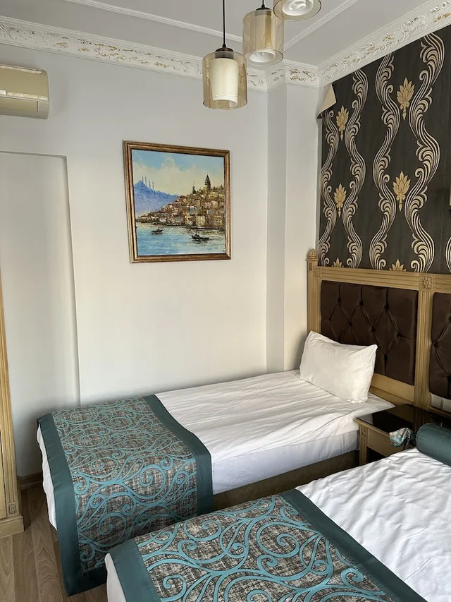 1 Bedroom, Family, Quadruple, 1 King and 1 Single Beds, Murphy Bed، Blue Tuana Hotel 1/10