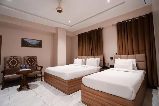 جناح ديلوكس بسرير مزدوج وسرير فردي، Hotel Pearl Inn 1/1