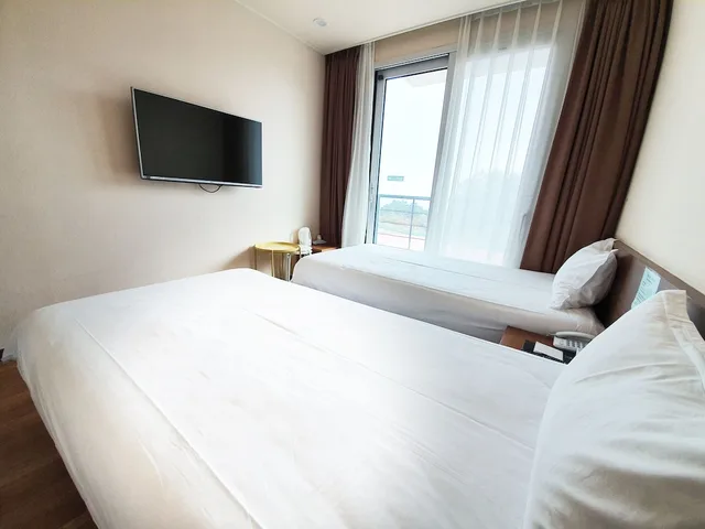 غرفة اقتصادية بسريرين منفصلين، Jeju Ocean Blue Hotel 1/5
