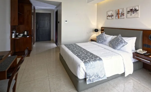 غرفة ديلوكس بسرير كوين، Sky City Hotel Dhaka 1/5