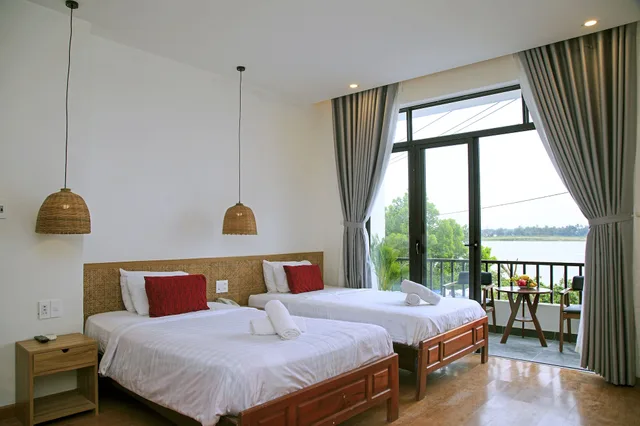 غرفة بسريرين منفصلين بشرفة، Gia Huy Riverside Hotel Hoi An 2/10