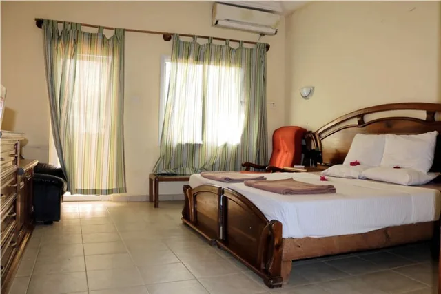 غرفة قياسية بسرير كوين بإطلالة على الحديقة، Palm Beach Resort Banjul 3/5