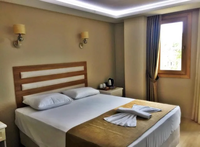 غرفة ديلوكس بسرير مزدوج بإطلالة جزئية على البحر، Feza Otel 2/8