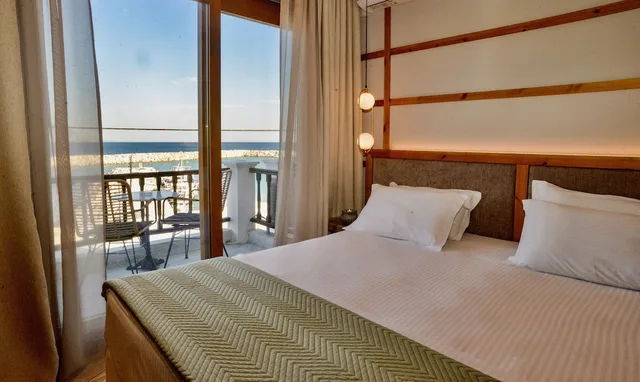 غرفة ديلوكس بسرير كينج بإطلالة على البحر، Sunrise Hotel 1/10