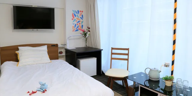 غرفة ثلاثية بسرير مزدوج وسريرين منفصلين في الطابق العلوي، Sakuragawa Riverside Hotel 9/10