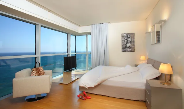 جناح ديلوكس بسرير كينج وسريرين مزدوجين بإطلالة على البحر بـ3 غرف نوم، Olympic Residence Deluxe Apartment 1/2