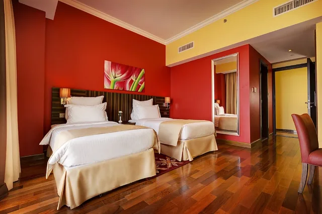 جناح رئاسي بسريرين كينج وسرير فردي، Abidos Hotel Apartments Dubailand 1/6