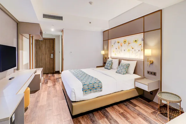 Deluxe, Double Bed, Sunday Hotel Sunset Road Near Trans Studio Mall 1/4