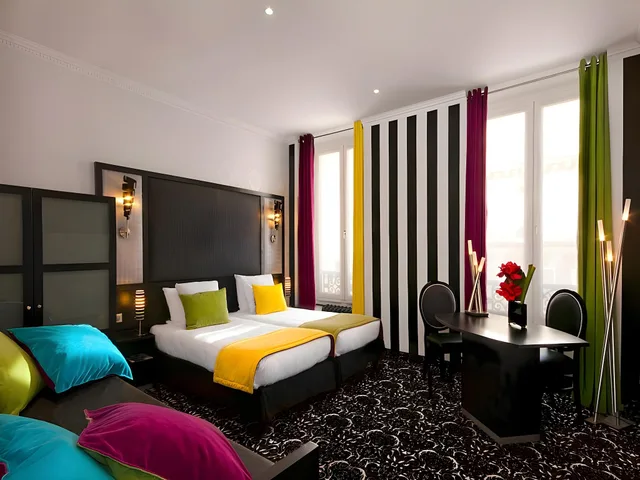 غرفة بريفيليج ثلاثية بثلاثة أسرّة، Hotel Peyris Opera 1/3