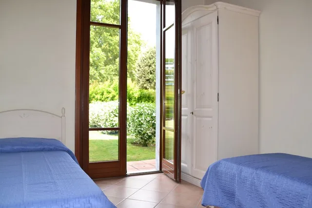 شقة بسرير بطابقين وسرير كوين بغرفتي نوم مع أريكة، Residence Garda Resort 3/8