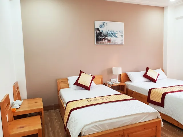 غرفة ديلوكس بسرير كوين وسرير فردي، Quy Nhon Center Hotel 4/6