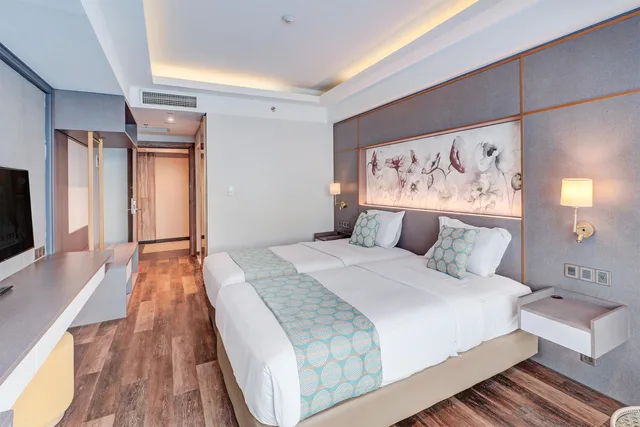 Suite, Twin Beds, Pool Access، Sunday Hotel Sunset Road Near Trans Studio Mall 1/5
