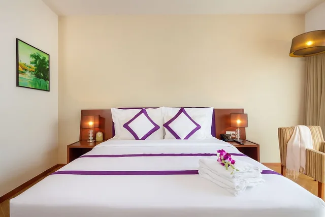 غرفة ديلوكس بسرير كينج بإطلالة جزئية على البحر، TTC Hotel - Michelia 4/10