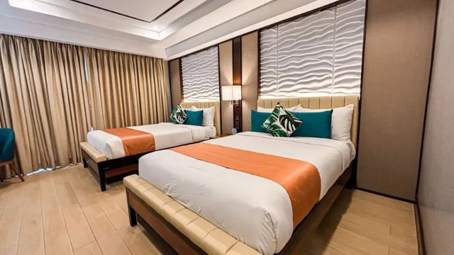 غرفة ديلوكس رباعية بسريرين مزدوجين، Puerto De San Juan Beach Resort Hotel 2/3
