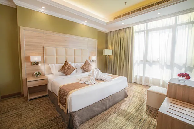 جناح جونيور بسرير كينج مع أريكة، فندق إيريديوم 70(Iridium 70 Hotel) 3/7