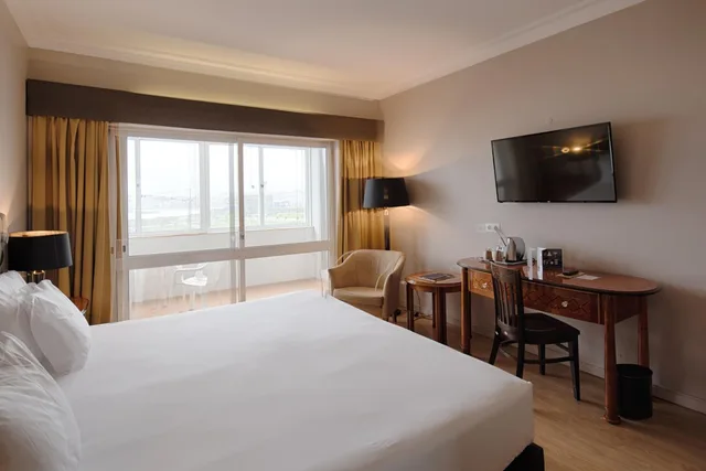 غرفة بسرير مزدوج أو سريرين منفصلين، Golden Tulip Porto Gaia Hotel 3/8