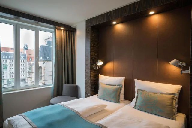 غرفة قياسية بسرير كينج، Hotel Motel One Leipzig-Nikolaikirche 1/9