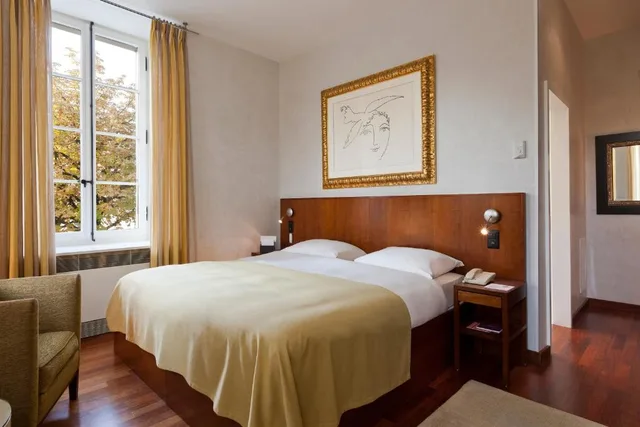 غرفة تنفيذية بإطلالة على البحيرة، Angleterre Residence 3/4
