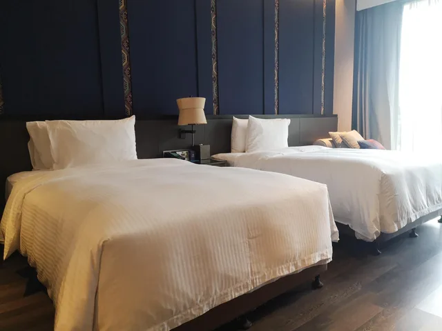 غرفة بسريرين منفصلين بإطلالة على الحديقة، Wanda Realm Resort Nanning 2/3