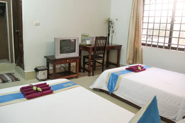 غرفة بسريرين منفصلين، Tropical Breeze Guesthouse 2/4
