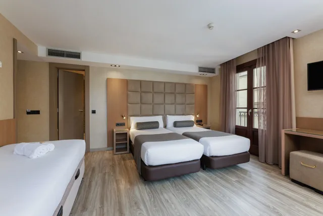 غرفة ثلاثية مفردة، Hotel Suizo 2/9
