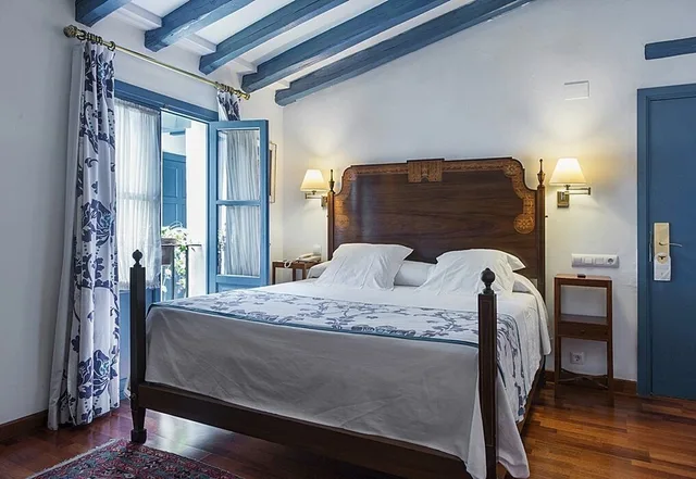 غرفة أساسية بسريرين منفصلين في الملحق، Las Casas De La Juderia Sevilla 2/10