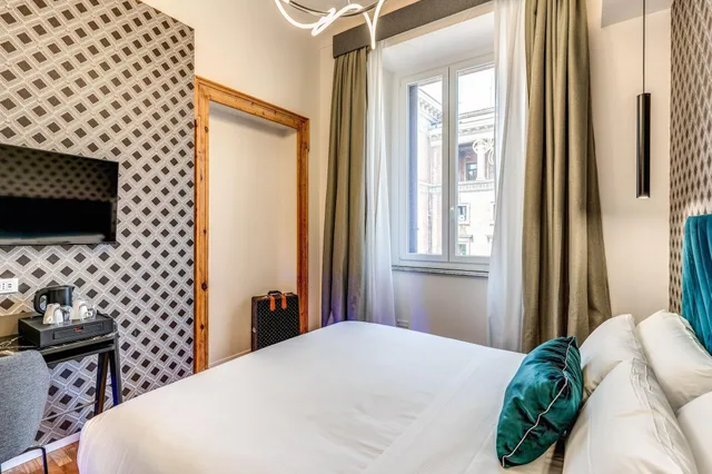 غرفة بسرير كوين، Arenula Suites 1/6